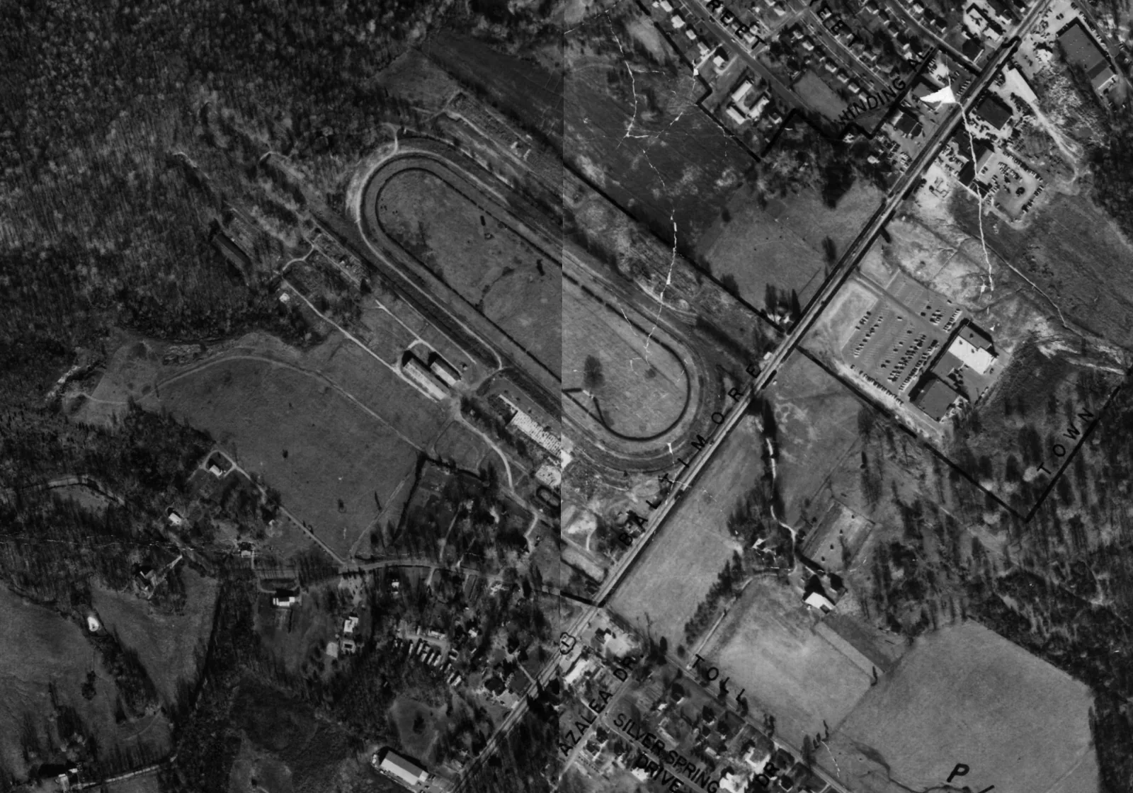 1967 aerial survey photo showing a racing oval with grandstand and barn structures on the future Harford Mall site, with hand-lettered street names inked on the print